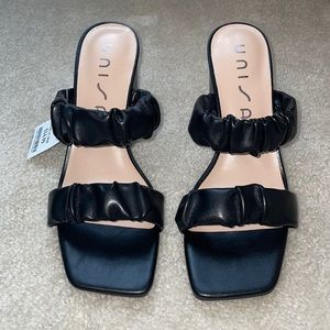 Black heels with chunky heel; never worn with tags; size 7.5